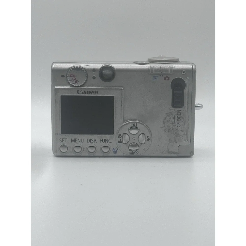 Canon PowerShot S400 Digital ELPH 4.0MP Silver Camera Untested For Parts/Repair